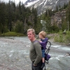 Kevin carrying grandson Matthew at Trick Falls, Montana
